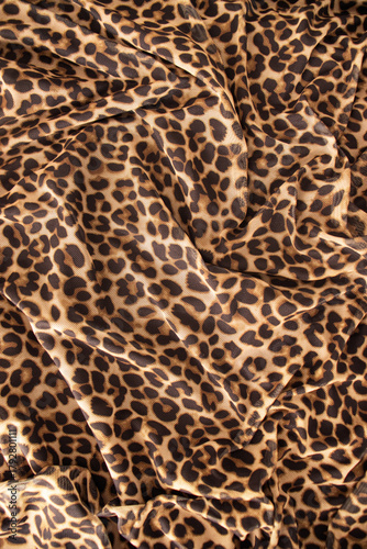 leopard print fabric with soft folds.