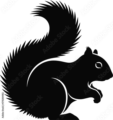 Black silhouette of a squirrel with a bushy tail