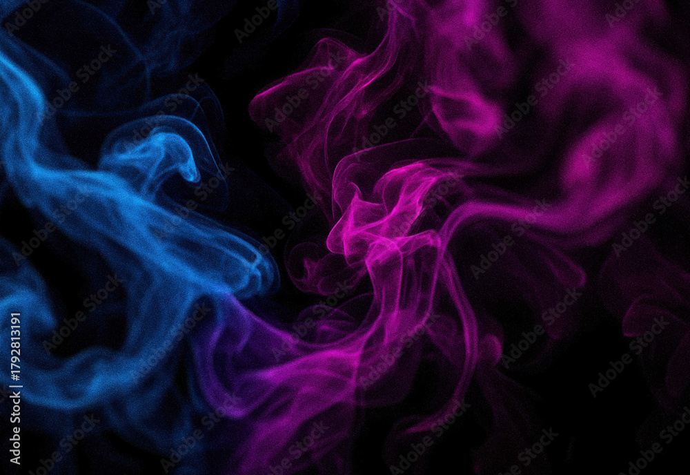Fototapeta premium Vibrant colored smoke swirls across a dark studio background, creating an abstract atmospheric texture for cinematic design, bold marketing visuals, and dramatic compositions