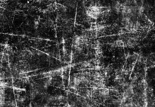 High resolution black grunge texture featuring distressed surface with random scratches and worn effects, ideal for dark backgrounds, overlays, posters, typography and design work.
