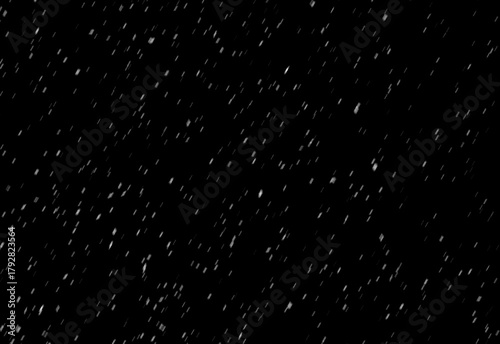 Abstract night scene with a deep black background scattered by countless tiny white specks resembling stars or snowflakes, creating a serene celestial atmosphere