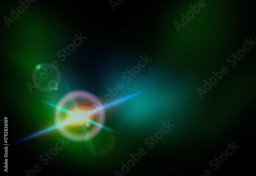 Wallpaper Mural Abstract cosmic lens flare in a dark space backdrop featuring neon green and blue rings, vibrant stardust, and a bright cross light burst suitable for sci fi and design projects Torontodigital.ca