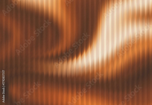 Fényképezés Abstract close up of warm orange metallic texture with vertical ridges and soft