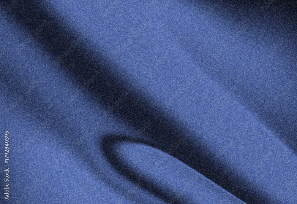 Obraz premium Abstract close-up of a blue fabric texture featuring folds, grainy surface, and smooth curves, highlighting depth, shading, and subtle shadows for modern design and backgrounds