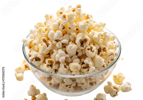 A large bowl overflowing with freshly popped popcorn isolated on transparent background