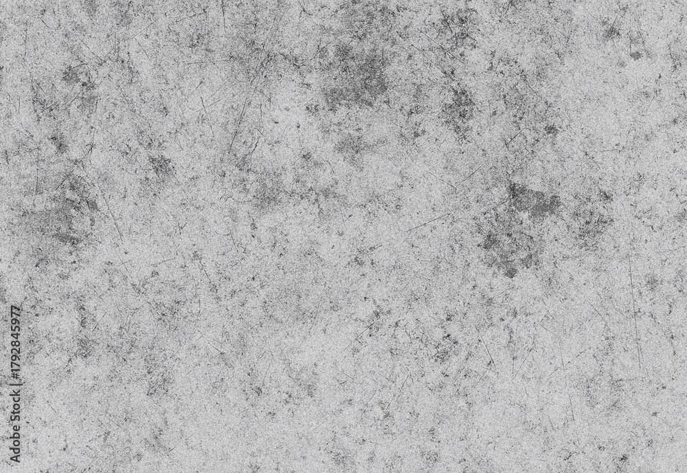 Fototapeta premium Close up of a weathered concrete surface texture with rough gray speckled pattern and subtle irregularities, ideal background for industrial design and architectural mockups