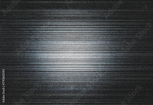 Abstract digital noise and screen static with a soft bright center glow, creating retro television interference aesthetic, glitchy texture, and cinematic, moody visual ambiance