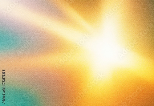 Fotografia Abstract vibrant sunrise light diffusion with warm golden yellow and orange rays