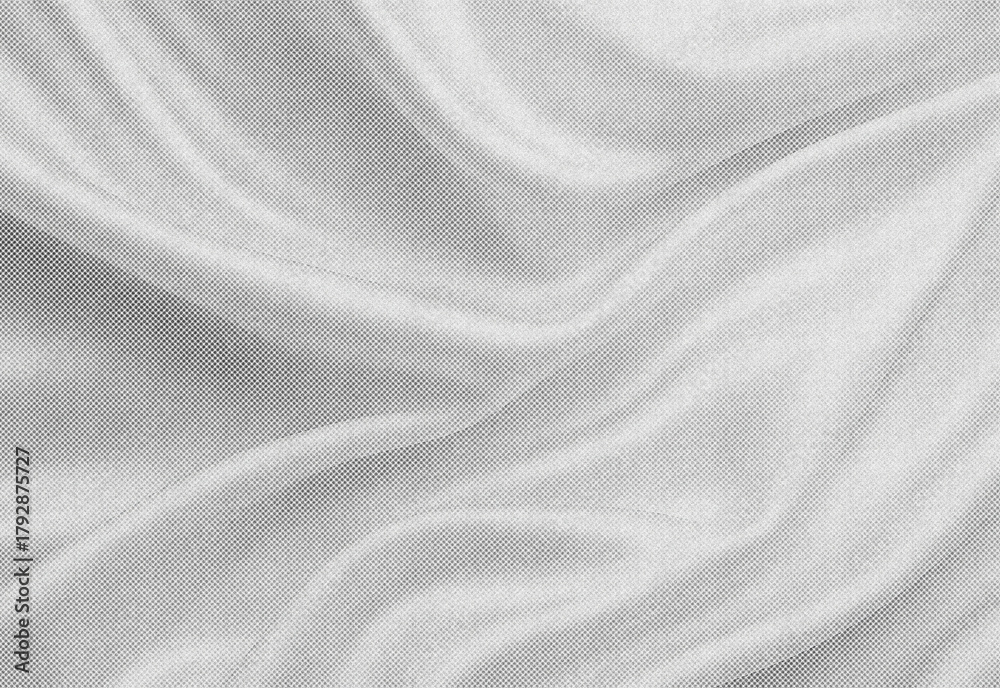 Fototapeta premium Close up of soft gray fabric with flowing folds and subtle woven texture, abstract background ideal for fashion, textile, design, or product photography projects