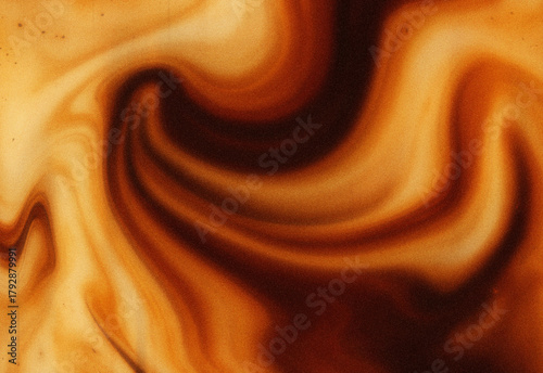 Foto Close-up of swirling caramel and coffee tones in an abstract marbled texture with warm earthy colors, ideal for design backgrounds, wallpapers, textures, and creative layouts