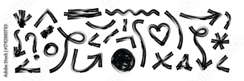 Set of Hand drawn doodle design elements, charcoal or pencil drawn marks. Paint brush stroke. Grunge brush strokes with distressed textures in rough hand drawn ink styles for dirty borders,