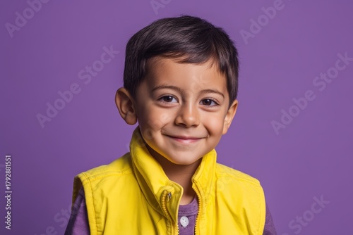 Smiling child with short da...