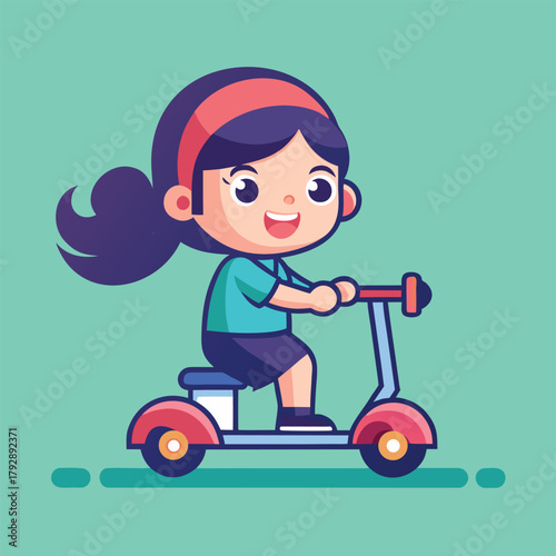Happy young girl enjoying a ride on her colorful kick scooter