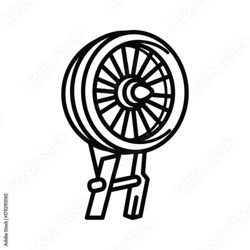 Line art illustration of a train wheel and suspension system