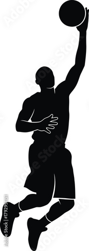Silhouette of a basketball player mid air making a slam dunk