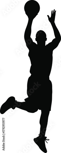 Silhouette of a basketball player jumping to shoot
