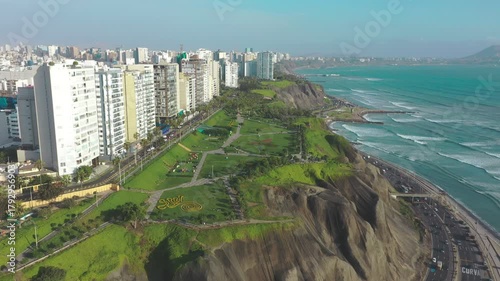 Aerial shot of lima modern cityscape featuring the Maria Reiche park overlooking the pacific ocean