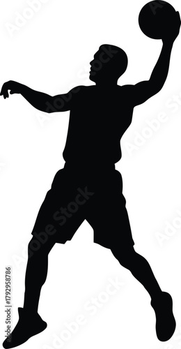Silhouette of a basketball player jumping to shoot
