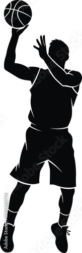 Silhouette of a basketball player in mid air shooting a basketball