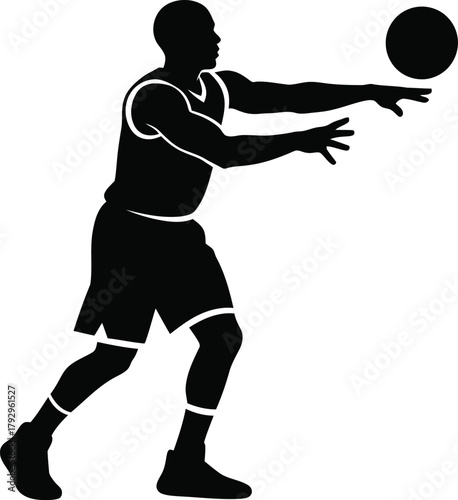 Silhouette of a basketball player in motion throwing a ball