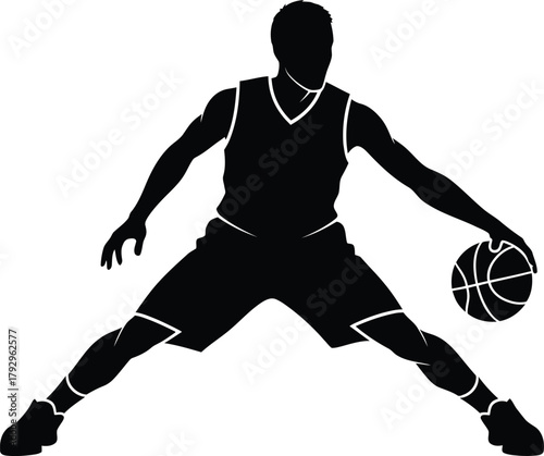 Silhouette of a basketball player dribbling the ball
