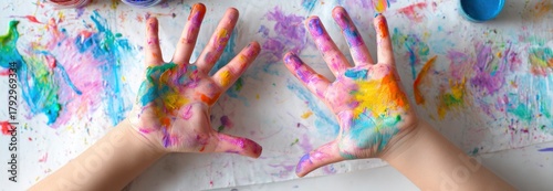 Wallpaper Mural Colorful Painted Hands on Craft Table with Artistic Mess Around Torontodigital.ca