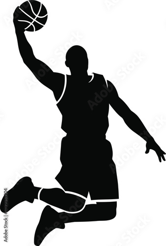 Silhouette of a basketball player performing a powerful slam dunk