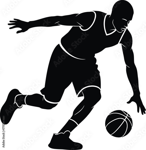 Silhouette of a basketball player dribbling the ball during a game