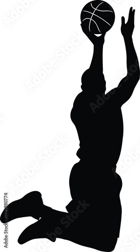 Silhouette of a basketball player jumping to shoot