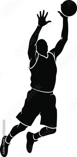 Silhouette of a basketball player jumping to shoot a ball