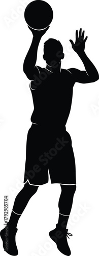 Silhouette of a basketball player shooting a ball