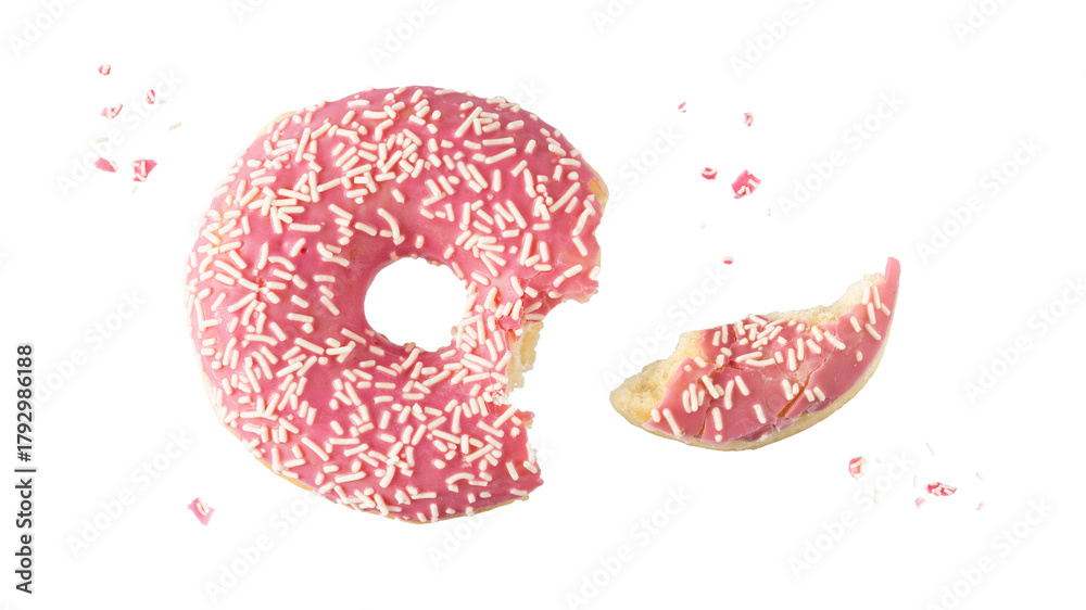 Naklejka premium Pink glazed single bitten donut with white sprinkles and crumbs flying isolated on white