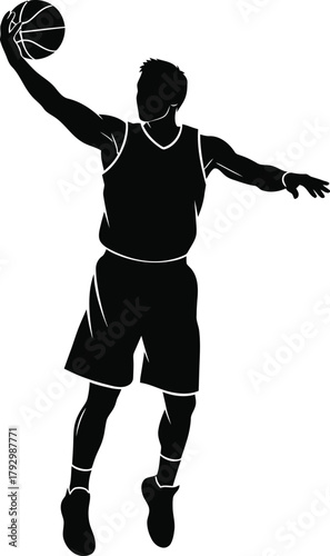 Silhouette of a basketball player mid air during a dunk