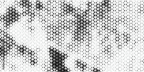 Black triangular geometric pattern forming a gradient effect, creating a modern abstract background design