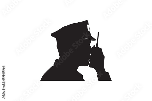 Silhouette of a police officer using a walkie-talkie