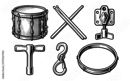 Vintage drum set components with detailed engraving style
