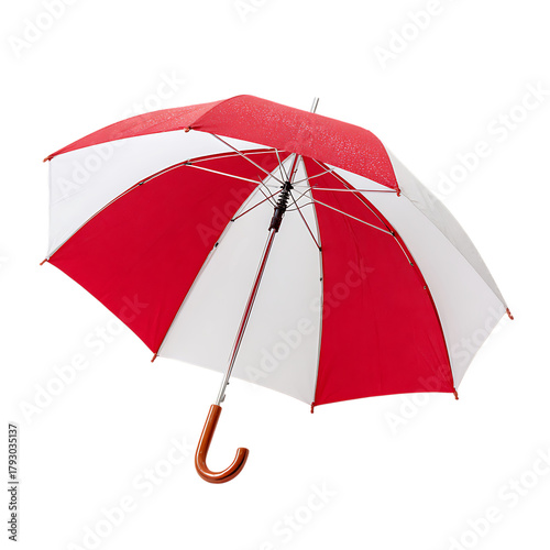 Isolated red and white umbrella on beach