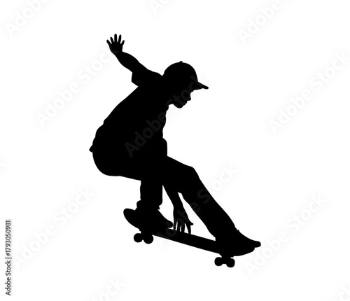 Silhouette of a skateboarder performing a trick on a white background