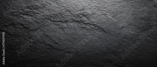 Dark slate texture with rough surface and gradient lighting