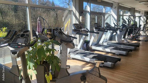 Empty Treadmills in Sunny Gym