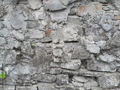 Background of very old stone wall texture photo