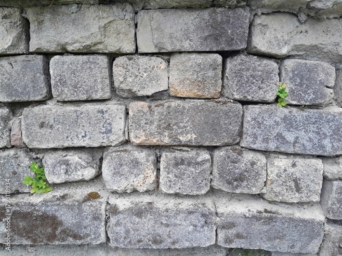 Background of very old stone wall texture photo