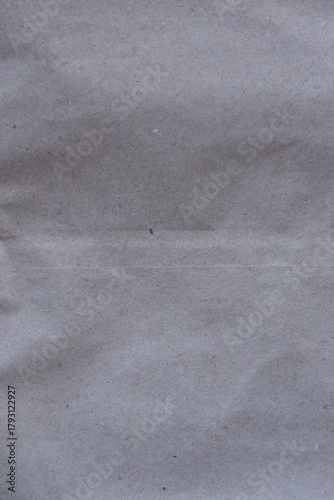 Brown crumpled recycled paper texture background. Kraft Paper