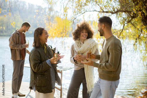Friends enjoy a sunny lakes...