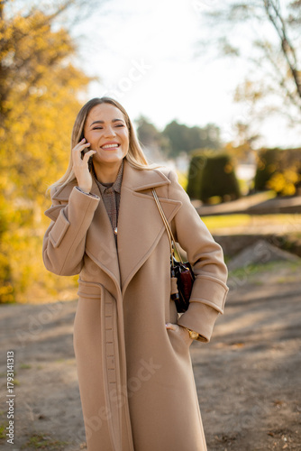 Woman enjoying a sunny day ...