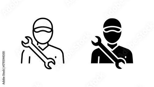 Mechanic with wrench professional repairman holding tool for fixing machinery and vehicles in the workshop