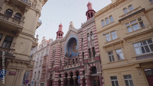 Morning footage of the Jubilee Synagogue’s vibrant Moorish Revival facade, featuring striped patterns, ornate arches, and striking architectural details. Captured in Prague, Czech Republic.