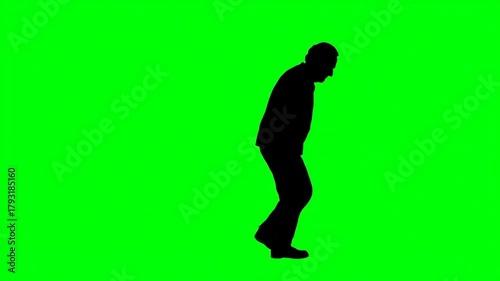 Green Screen Silhouette of Elderly Man Walking with Head Down, Slow Pace and Somber Mood, Chroma Key Footage Ready for Compositing