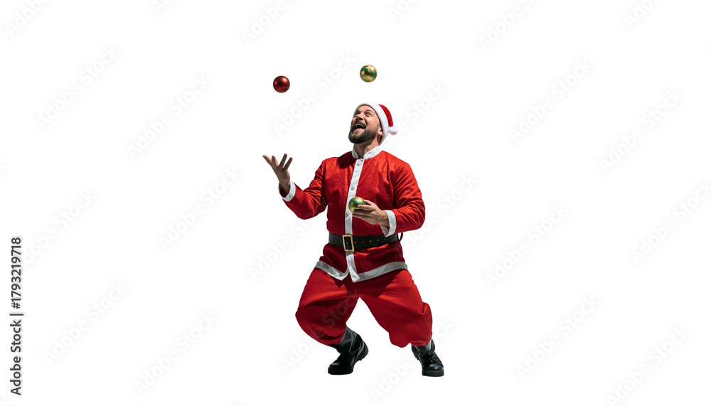 Obraz premium A man dressed as santa claus joyfully juggling colorful balls while wearing a festive hat and outfit png with transparency