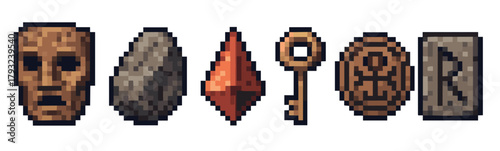 Collection of six pixel art objects including a wooden mask, a stone, a red crystal, an old key, a bronze coin, and a carved stone tablet.